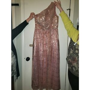 A formal rose gold sequined dress